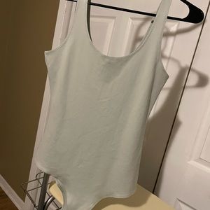 New - Light green body suit - medium